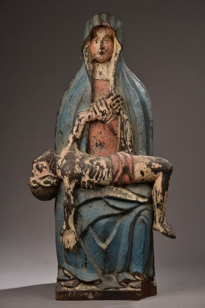 null Pietà en bois sculpté polychrome (manques).
Travail ancien dans le goût du XVIIe...