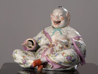 Grand bouddha en porcelaine polychrome à tête articulée. Meissen, XIXème siècle....