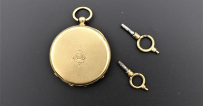 null Une montre de poche en or 750°/°° (18K) à décor guilloché et ciselé d'un bouquet....