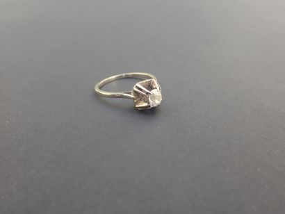 null Solitaire ring in 18K white gold set with an old cushion-cut diamond (4.75x4.20x3.38)....