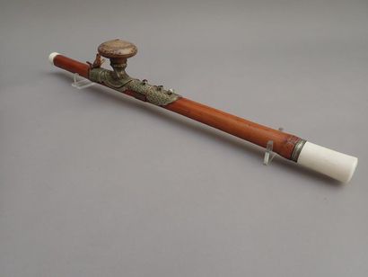 null Opium pipe made of stained bamboo, ivory tips (a rough and glued tip). Plate...