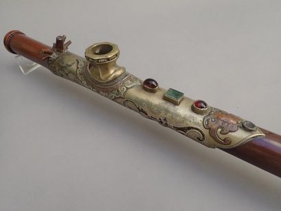 null Tinted bamboo pipe decorated with cabochons (one stone is missing), chiselled...