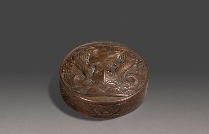 null Bronze circular paper press with nautical decoration and clashing dragons. Inscription...