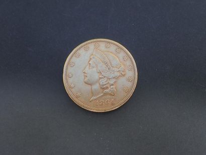  États-Unis. Une pièce de 20 dollars or, type tête de Liberté, 1864. 
Poids : 33,4...
