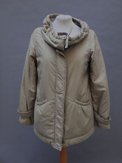 null Set of 8 jackets and coats T36 to T42 :

- PRADA. A beige polyester jacket with...