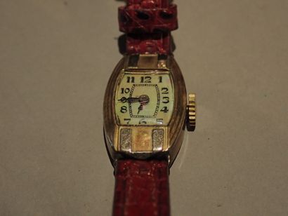 null A lady's watch in gold 750°/°° and silver. Double head hallmark of wild boar...