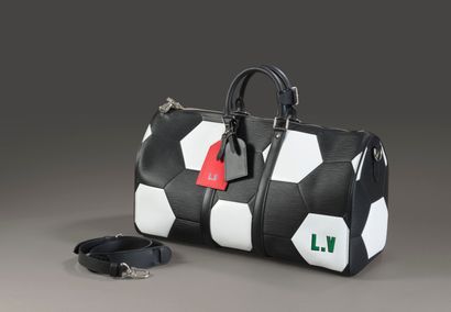 null 
Louis VUITTON. Black and white leather "Keepall" bag.

Limited edition, collaboration...