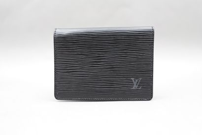 null Louis VUITTON. Wallets "Marco" in cowhide Epi leather with matte cross grain...