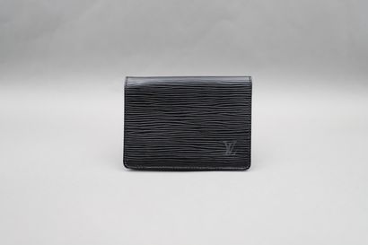 null Louis VUITTON. Wallets "Marco" in cowhide Epi leather with matte cross grain...
