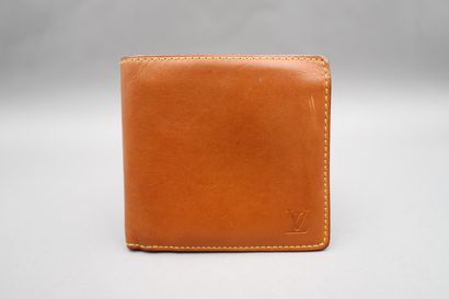 Louis VUITTON. Men's wallet in nomadic leather....