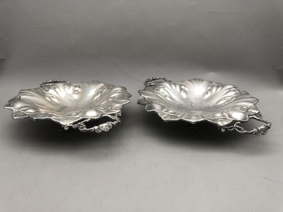 null ARMAND FRENAIS - PARIS

A pair of two-handled silver-plated cups, decorated...