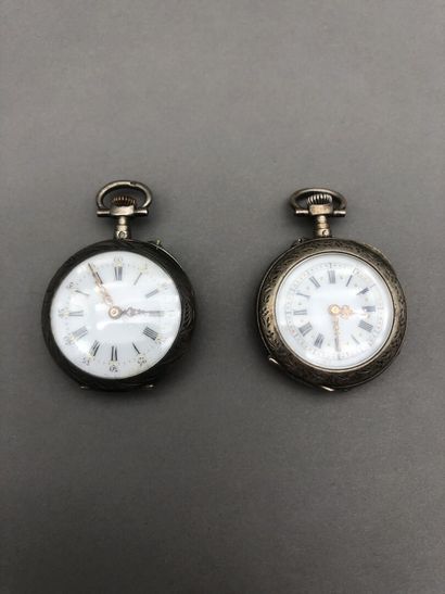 A pair of silver pocket watches, comprising:...