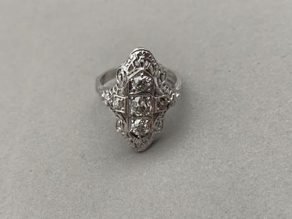 A marquise ring with delicate openwork foliage...
