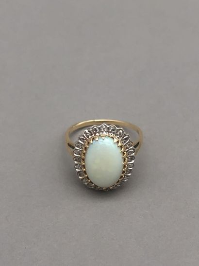 null Pompadour ring in two-tone 18K gold set with an opal cabochon (small chips,...