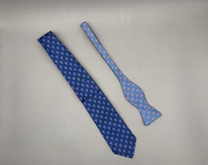 null HERMÈS

Lot including: 

- A blue-king tie with sky blue overstitching.

- A...