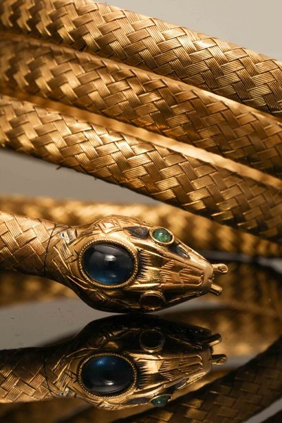null Bracelet serpent en tressage d'or jaune 18K (750 °/°°) formant trois tours,...