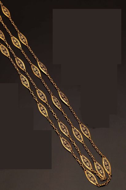 Long chain vest in 18K gold (750 °/°°). Decorated...