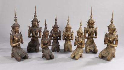 null Lot of 8 sculptures in bronze and gilded copper alloy representing eight female...
