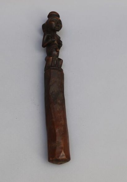 null Hardwood pestle stick with a brown patina and a female statuette. 

Luba Hemba,...