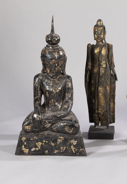 null Sculpture in carved wood with patina, partially enhanced with gold leaf, depicting...
