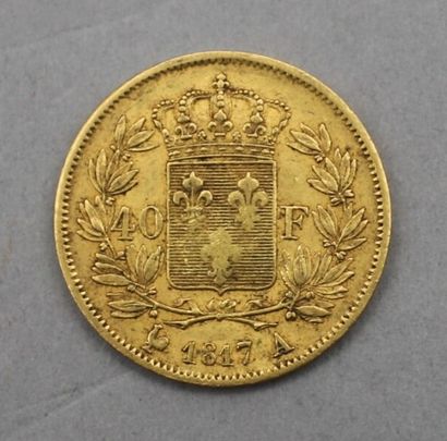 null Pièce de 40 Francs en or. Type Louis XVIII, en buste simple surmontant une tête...