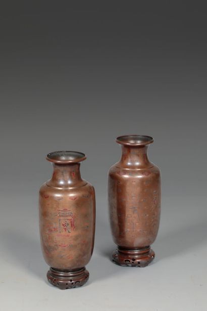null Large pair of bronze vases with silver and copper niello decoration of animated...