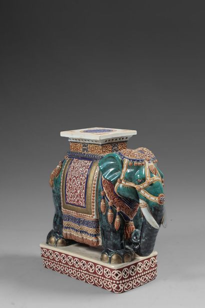 null BIEN HOA. 

Elephant in stoneware partially enamelled with green background...