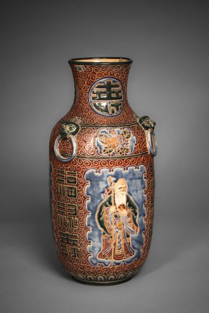 null BIEN HOA.

Stoneware vase partially enamelled with decoration of the three deities...