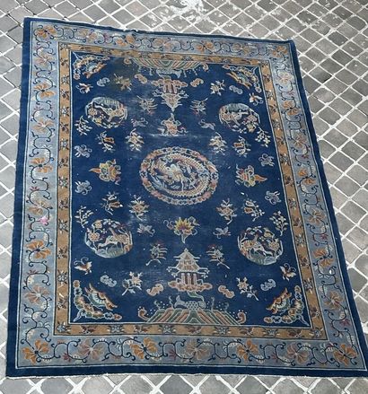 Carpet decorated with stylized motifs, blue...