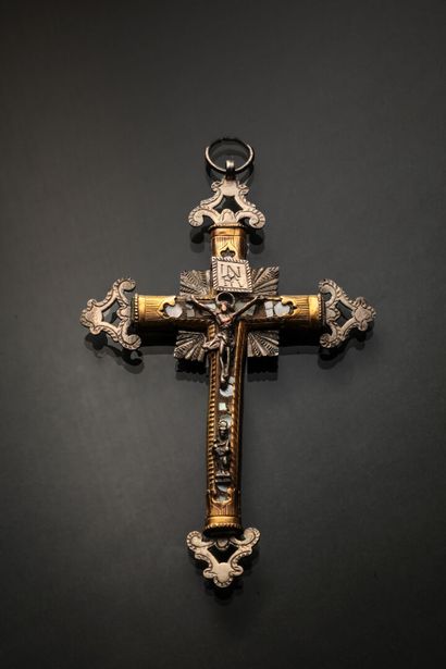 Crucifix in wood with mother-of-pearl inlays....