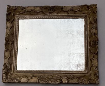 Rectangular mirror in molded, carved, stuccoed...