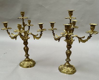 Pair of chased and gilded bronze candelabras...