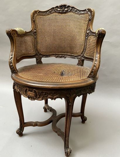 
Armchair with swivel seat in stained wood,...