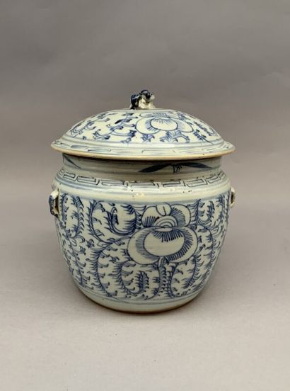 null Covered pot with a flared body in porcelain. Blue and white cameo decoration...