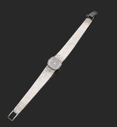 null OMEGA
Montre-bracelet de dame en or gris 18 K (750 °/°°). Cadran à fond noir...