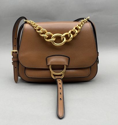 MIU MIU


Gold leather trapeze handbag. Drop...