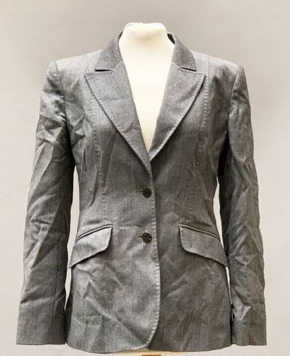 null Lot including : 


- Guy LAROCHE


Jacket with black shoulders and gold and...