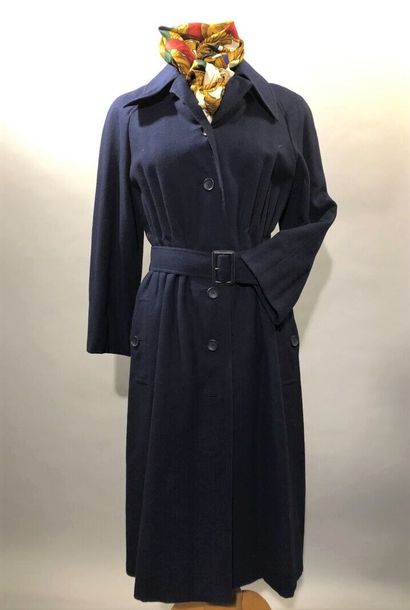 null Lot including : 


- Jean PATOU, Paris, circa 1980


Navy blue wool coat for...