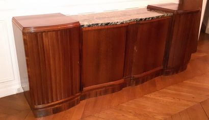 A low straight sideboard in molded rosewood...