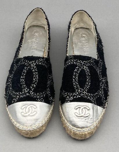 CHANEL

Pair of espadrilles in black canvas...