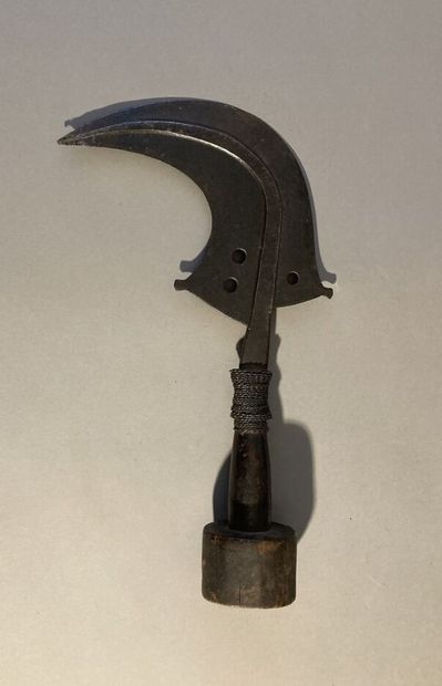 null Set comprising: 
- Sickle with wooden handle, nails and copper. Socket. Mangbetu,...