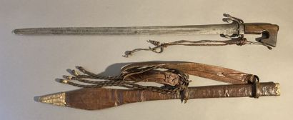 null Nimcha sword, Morocco.
18th-19th century. 
In a leather Kaskara scabbard. Sudan....