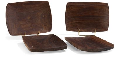 null Suite of four curved rectangular rosewood bowls. 
Dimensions: 25.5x17.5 cm....