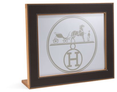 null HERMES
Large rectangular photo frame in light mahogany sheathed in chocolate...