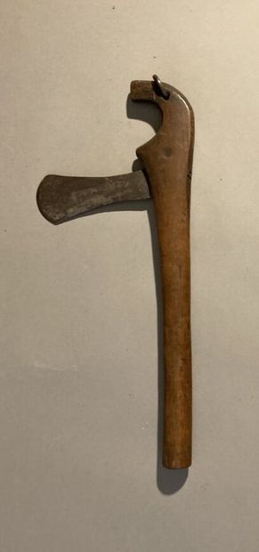 null Set including: 
- Axe with wooden handle and metal rings. Fang, Gabon. 
Size:...