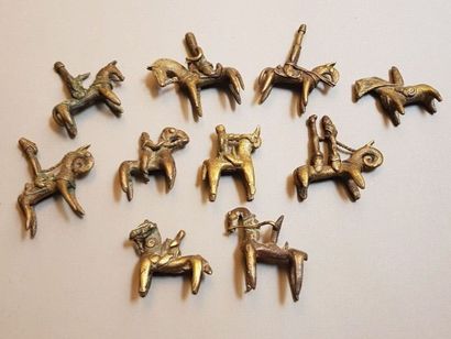 Lot of 20 bronze weights decorated with horsemen...