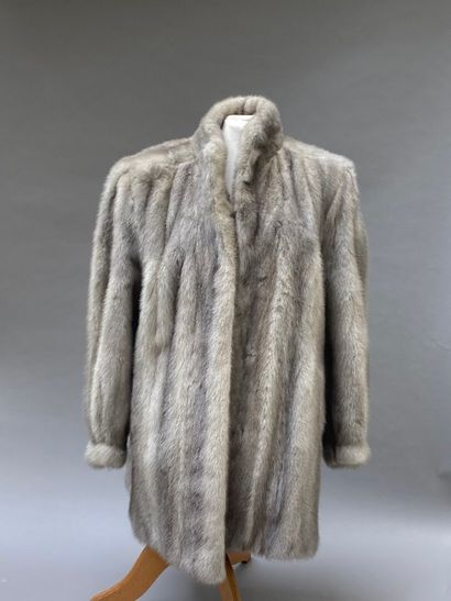 Set of two fur coats, one a gray mink.