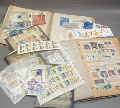An album and binder of stamps, plates, pockets,...