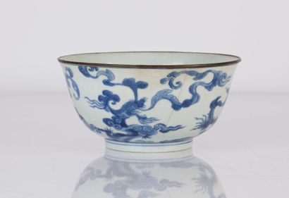 null Hué blue-white porcelain bowl decorated with scrolls and zoomorphic clouds transforming...