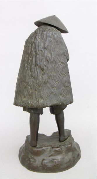 null Pêcheur du Tonkin.

Bronze à patine brune. Vers 1920.

Hauteur : 51 cm.


